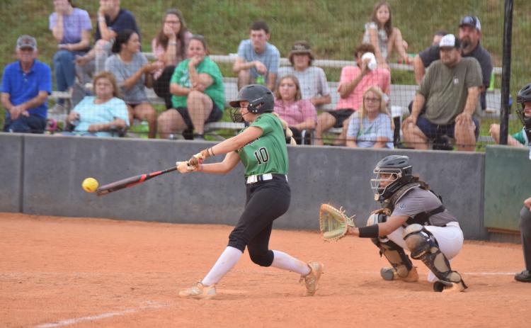 Keely Emmons makes contact in a game earlier this season against Elbert County.