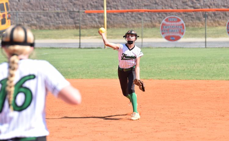 Shortstop Piper Crump throws to first baseman Brailey Randall (above photo) for an out in the Rabun game.