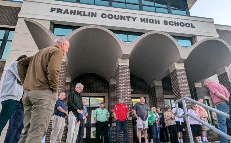 Community members, school officials, parents and students gathered at Franklin County High School – and the other schools in the county – Monday morning for a time of prayer for protection of the schools after campuses were closed Friday following an unfounded threat in the wake of a school shooting in Barrow County. (Photo by Angela Scoggins)