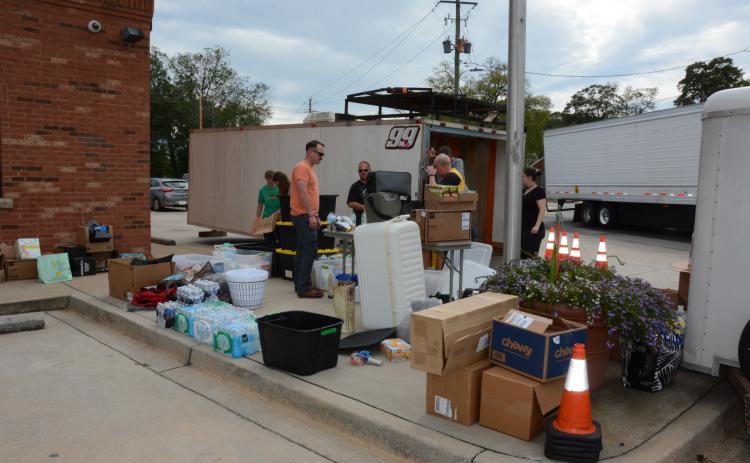 The parking lot of the Lavonia Police Department filling up with trailers loaded down with donated supplies that will be taken today to Avery County, N.C. (Photo by Eavenson)
