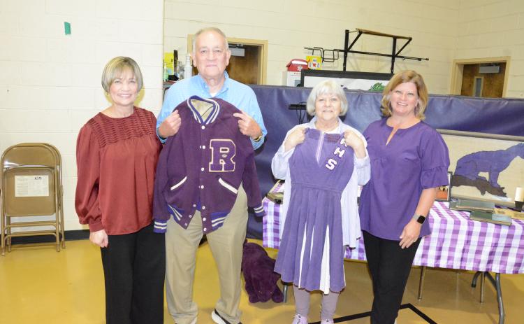 ROYSTON – More than 100 past and current students and faculty members attended the Panther Walk at the old Royston Elementary School Sunday. Everyone who has ever attended elementary or high school in Royston was invited to wander the halls one last time, chat with old classmates and teachers and to find their picture in old yearbooks. History was on display, including the Royston High School letterman jacket of Ed Burton and the cheerleading outfit of Sherry Eason. These items, along with other memorabilia