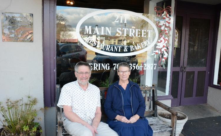 211 Main Street Restaurant founders Bob and Trish Toews have sold the cornerstone business in downtown Lavonia to Top Dawg Grillers owners Chris and Kim Rice. (Photo by Eavenson)