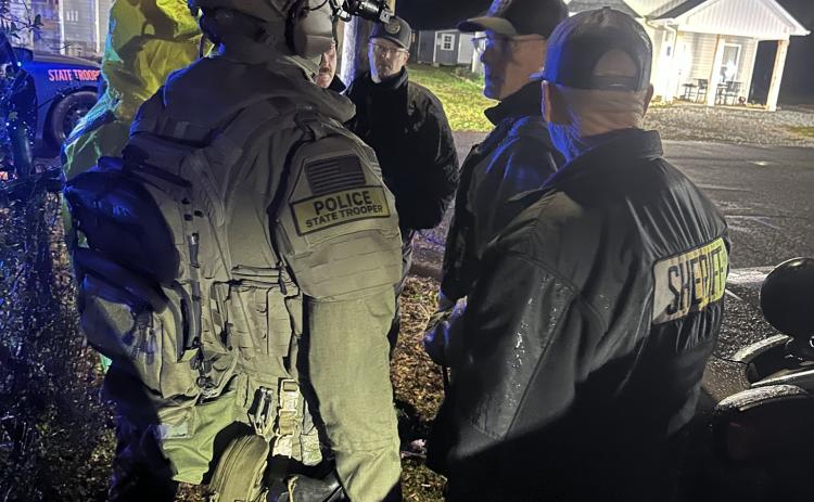 Sheriff Scott Andrews talks with officers during a standoff with a suspect at a home on Rainbow Drive in Lavonia. (Photo courtesy of the Franklin County Sheriff’s Office)