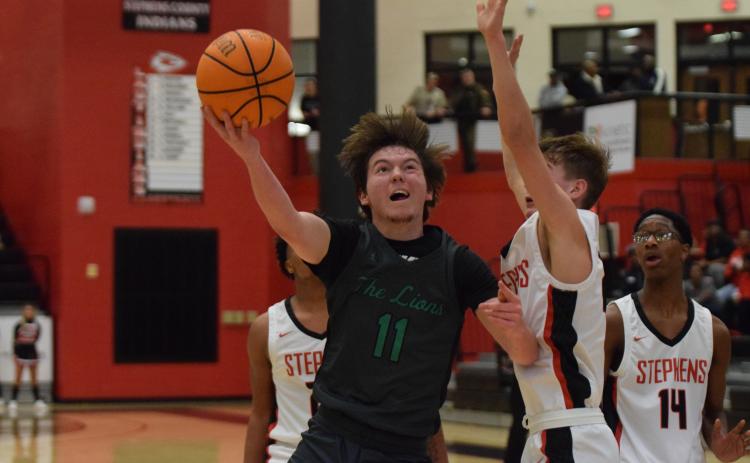 Bentley Huff (above) puts up a shot Tuesday against Stephens County.