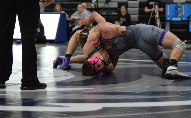 Lion Zane Puff works to turn a Union County opponent during the Area 8AA Duals Tournament. (Photo by Scoggins)