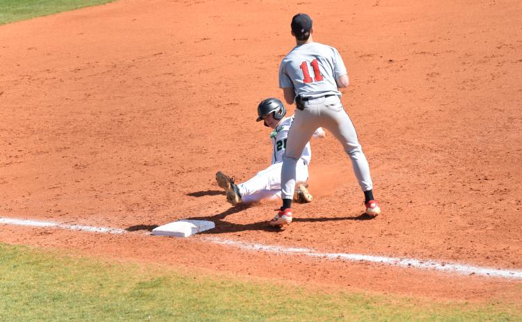 Parker Moorhead slides into third with a triple against Sonoraville Saturday in Carnesville. (Photos by Scoggins)