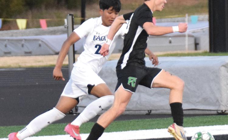 Eli Cooling drives toward the net before scoring a goal Tuesday in a victory over East Jackson in Carnesville. (Photos by Scoggins)