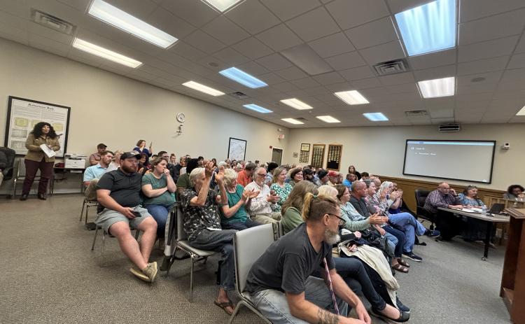 An estimated 220 people came to the Franklin County Board of Commissioners meeting Monday at the Franklin County Justice Center. Seating in the meeting room were full and people stood in the hallway and the parking lot. (Photo by Scoggins)