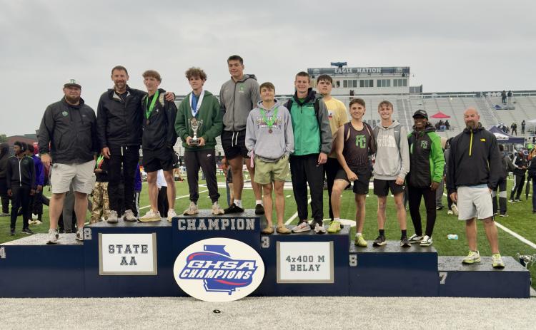 The Franklin County boys’ track team (top photo) placed second in the Class AA state meet. (Photo courtesy of Franklin County Track)
