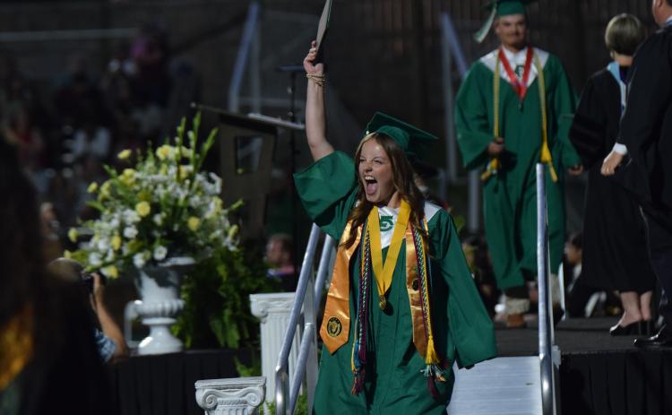 CARNESVILLE – Franklin County High School Class of 2025 salutatorian Kayla Parker celebrates Friday after walking off the stage from receiving her high school diploma during FCHS’ 61st annual Commencement Exercise at Jeff Davis Field at Ed Bryant Stadium. Parker and 236 classmates were awarded diplomas during the ceremony. For more photos from graduation, see Pages 6-7A. (Photo by Scoggins)