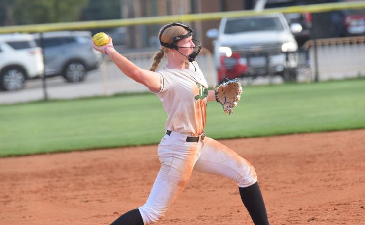 Lady Lion third baseman Brailey Randall makes a throw to first in a victory over Rabun County last week in Carnesville. Randall and the Lady Lions have four non-region games left before the start of the 8AA scheduled Tuesday. (Photo by Shane Scoggins)
