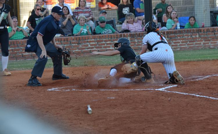Willow Morgan slides in safely to score a run against Hart County last week in the first round of the state tournament. (Photos by Shane Scoggins)