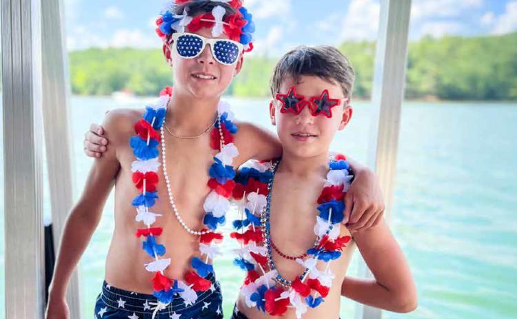 Kim Caudell of Toccoa captured this photo of her sons, Britt and Benjamin, celebrating Independence Day at Lake Hartwell. Caudell won $100 for her photo, which was featured on the cover of the 2025 summer edition of Lake Living magazine.
