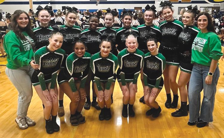 Members of the Franklin County High School Competition Cheer team are (front, from left) Carolina Madden, Livie Roach, Jaidan Silva, Ava Smith, Hadley Floyd, (back) Coach Caitlin Esco, Ciara Williams, Montana Chastain, Heaven LaBoon, Amelia Bennett, Layla Rosales, Hayden Carroll, Kenzie Adams and Coach Courtney Coleman. The team finished 11th in the state sectional Saturday in Cordele and will compete in the state meet Friday at the Macon Coliseum. (Photo courtesy of Courtney Coleman)