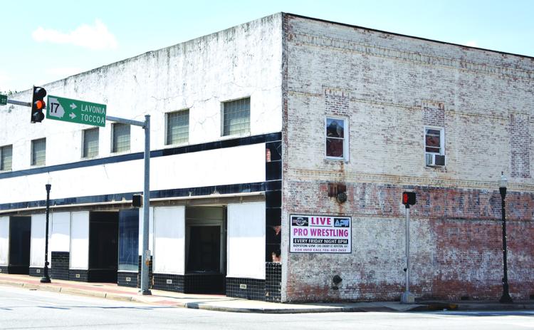 Plans for the demolition of the former Belk building in downtown Royston have been postponed due to the possibility of the building being sold and renovated.