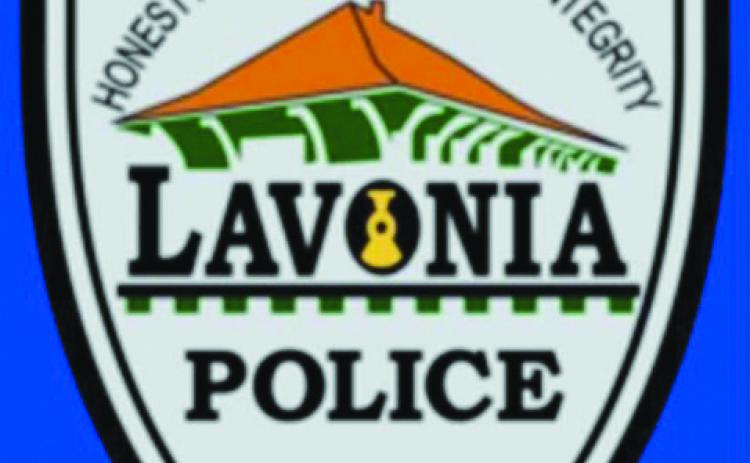 A tag cover violation led to the recovery of a stolen vehicle and three arrests on a host of charges, including for drug offenses.