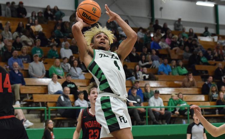 Lion senior Nava Ware goes up to score in Franklin County’s win over Stephens County Tuesday in the Lions’ Den. (Photo by Shane Scoggins)
