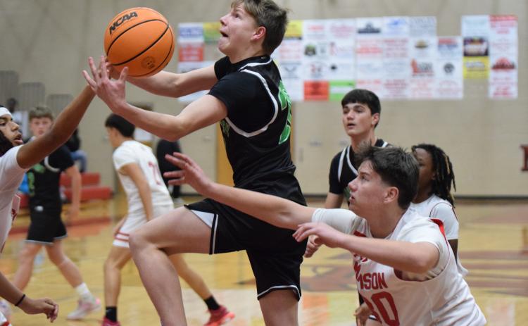 The Franklin County Middle School eighth grade Cubs secured the top seed in the upcoming NEGIAA region tournament with a 53-34 victory Tuesday over Madison County Middle School in Comer.