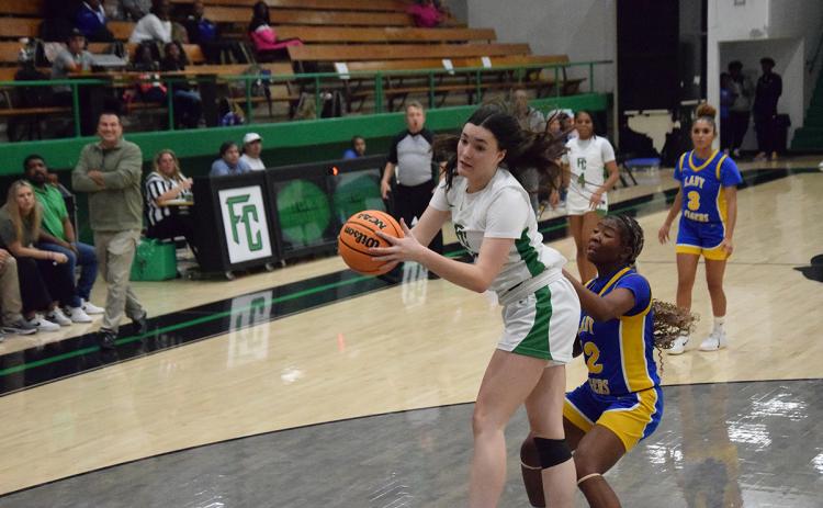 Avery Burton grabs a rebound in a Lady Lions win over Washington-Wilkes Wednesday in the Lions' Den.