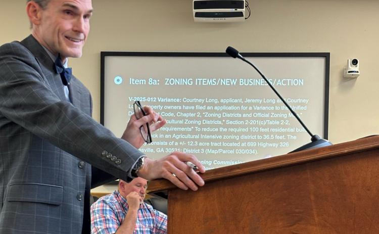 Franklin County attorney Ken Jarrard speaks to commissioners during a debate Monday over a variance request made by Chairman Courtney Long and her family. (Photo by Shane Scoggins)