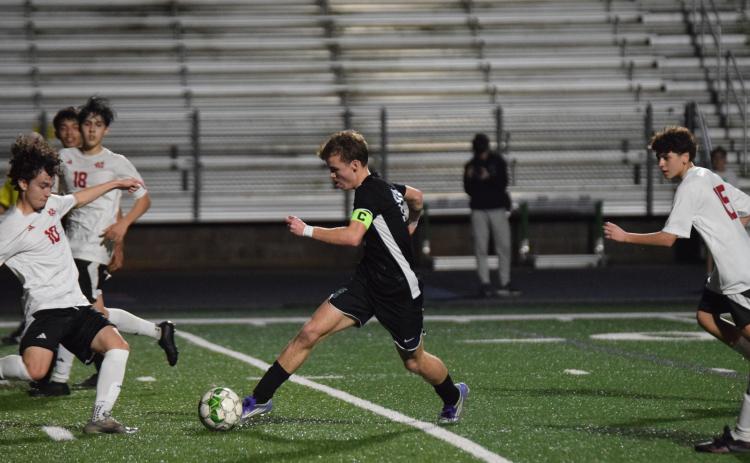Eli Cooling led Franklin County in a game Friday against Madison County at FCHS. Cooling tied the school record for career goals in the Madison County game and then broke the record Tuesday against Towns County in Hiawassee. (Photos by Shane Scoggins)