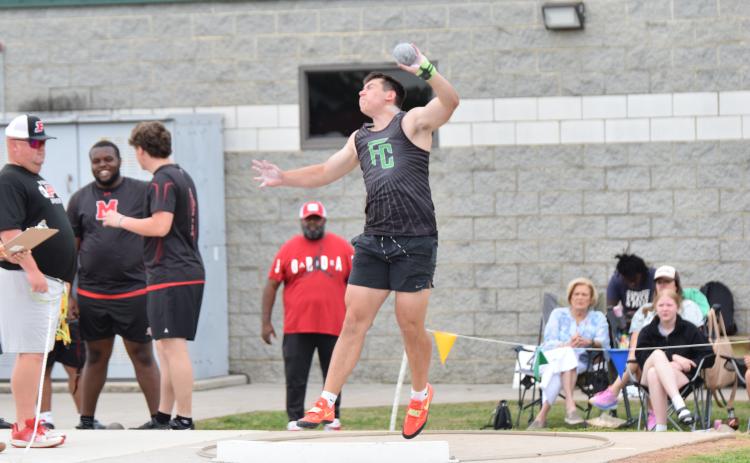 Candler Stone (pictured in action from last season) took first in both the shot put and discus at the Battle of the Blue Ridge meet at Habersham Central Friday.