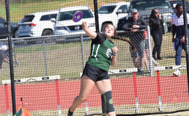 Carly Tanner makes  a throw in the discus event at the NEGIAA Region Championship Tuesday in Danielsville. Tanner won the discus and shot put to help lead the Lady Cubs to a region championship. (Photo by Shane Scoggins)