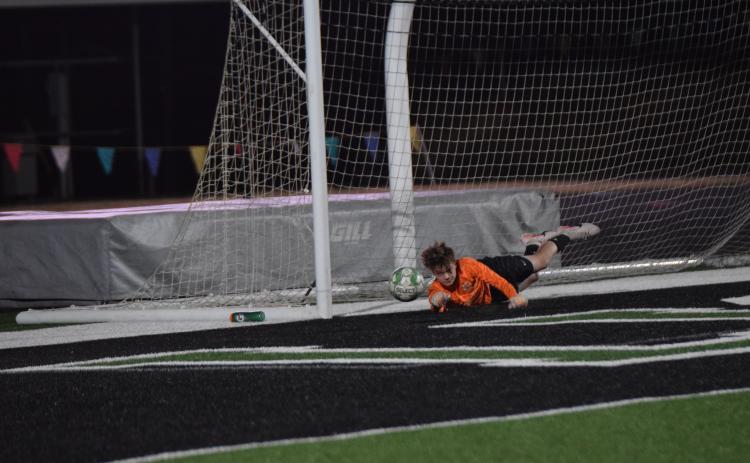 Freshman Ryland Lowery stops a Morgan County penalty shot during Franklin County’s first-round state playoff victory Friday at Jeff Davis Field at Ed Bryant Stadium. (Photo by Shane Scoggins)