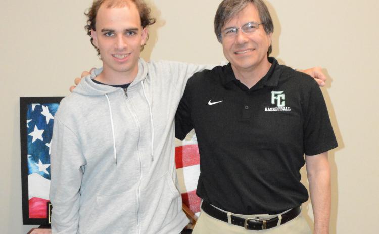 Swedish exchange student Fredrik Lundin (left) is spending the school year at FCHS and begin hosted by CTAE Director Brent Lemond (right) and his family. (Photo by Charlie Eavenson)