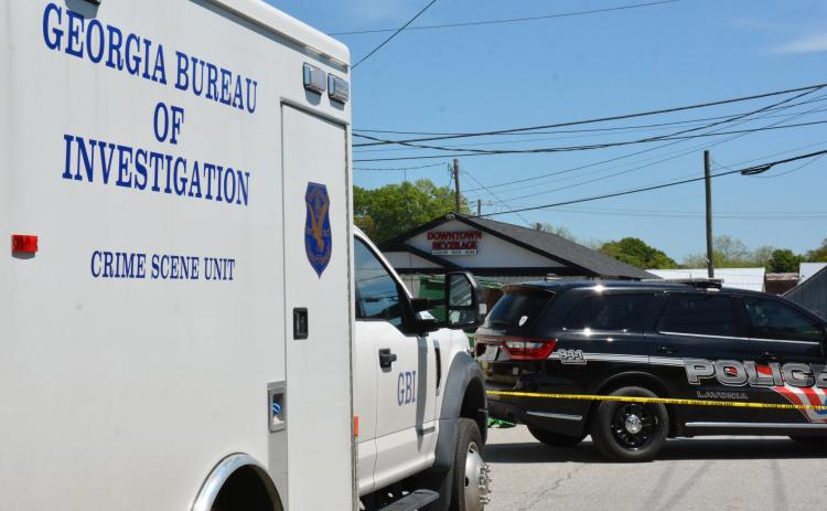 The Georgia Bureau of Investigation was in downtown Lavonia Friday as part of its investigation into a lengthy standoff between a Lavonia resident and law enforcement officers Thursday. The resident, Alan Joseph Chandler, died after he came out of his home firing a weapon at officers and members of the Georgia State Patrol SWAT Team and Franklin County Sheriff’s Office returned fire, a GBI press release said. (Photo by Charlie Eavenson)