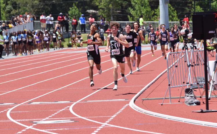 Will Gipson comes to the line to win the Georgia Class AA State Championship in the 1,600 meters Thursday in Athens. The win was Gipson’s third state championship in the last year. He added a fourth, in the 3,200 meters, later in the same meet. (Photos by Shane Scoggins)