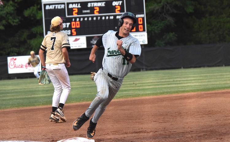 Senior Caden Cawthon rounds third on his way to score one of Franklin County’s 29 runs in a two-game sweep of Thomson Thursday in the second round of the state playoffs. (Photos by Shane Scoggins)