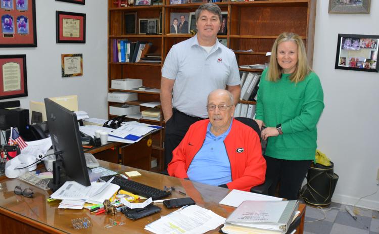 The staff of Beasley Tax and Financial Service, which is celebrating 50 years in business in 2026, includes Tommy Beasley (seated), Rusty Beasley (standing left) and Kelley Schulman. (Photo by Charlie Eavenson)