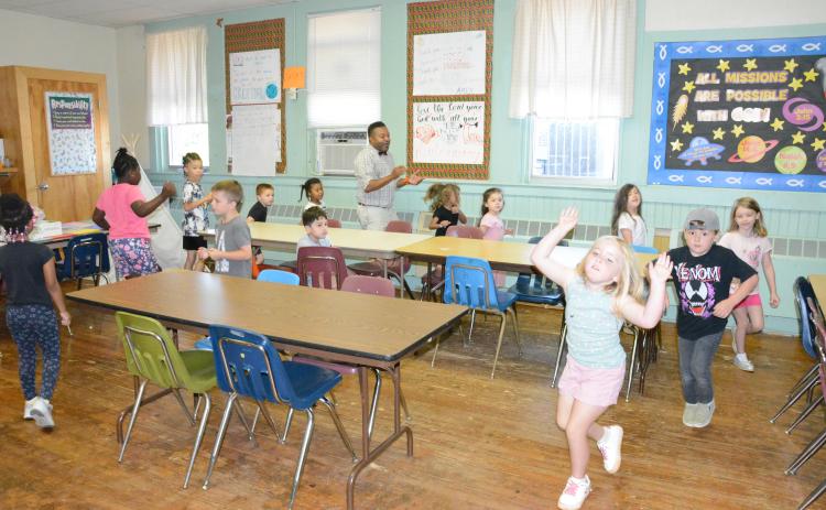 Learning is fun at the educational summer program being held at the Boyd Outz Learning Center. Students from kindergarten to second grade are working on sight words, math and problem-solving skills under the leadership of Kevin Norris and Karla Kidd. (Photo by Charlie Eavenson)