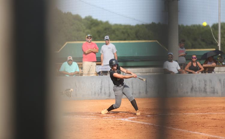 Belle Burton launches a home run against White County Tuesday. (Photo by Rose Scoggins)