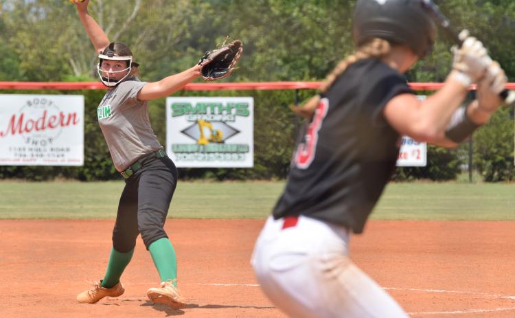 Anna Lunsford delivers a pitch to a Harlem hitter during a game Saturday at Madison County High School in Danielsville. (Photos by Shane Scoggins)