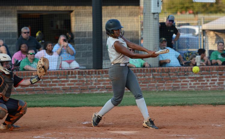 Cheyenne Bennett puts a ball into play in a Region 8AAA contest Thursday at Hart County. (Photo courtesy of Benjamin London of The Hartwell Sun)
