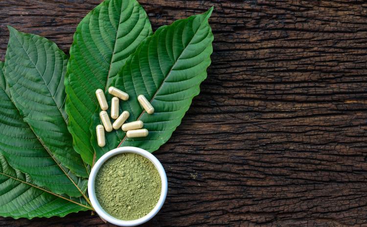 Kratom is a tropical tree native to Southeast Asia. Consumption of its leaves or products made from its leaves produces both stimulant effects (in low doses) and sedative effects (in high doses), and can lead to psychotic symptoms, and psychological and physiological dependence, according to the DEA.
