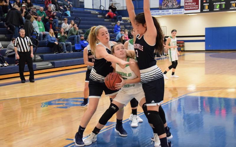 Bailey Aderholdt looks for room to put up a shot in Christmas tournament action against Powdersville, S.C.