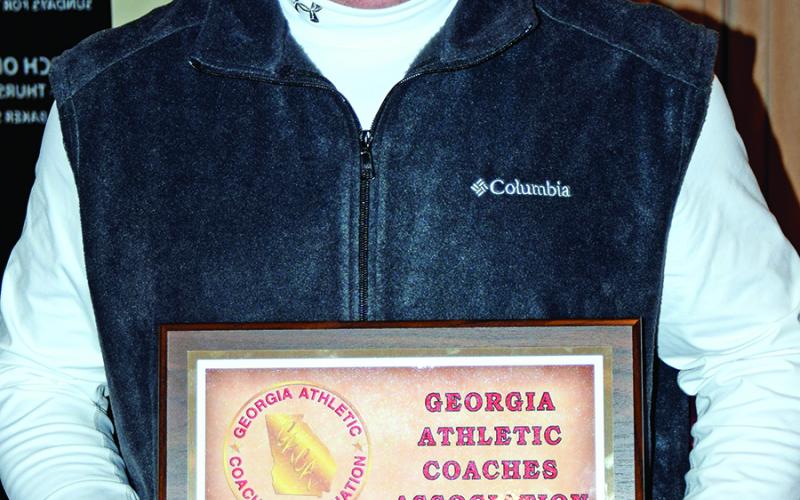 Coach Jason Oliver (right photo) was named State Coach of the Year by both the GACA and Dugout Club.