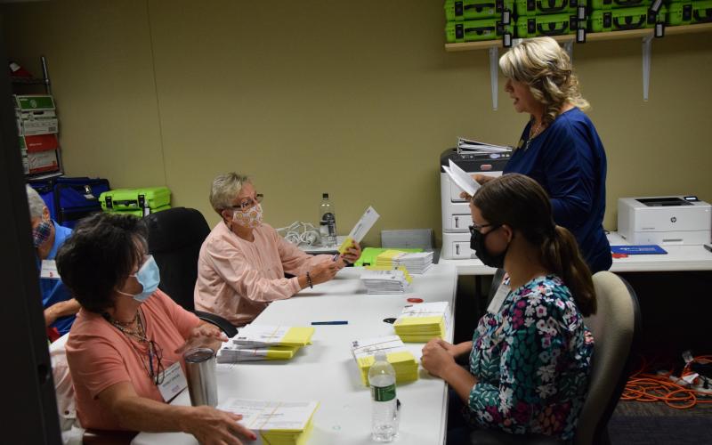 Franklin County Elections workers began processing hundreds of absentee ballots for Tuesday's primary elections last week.