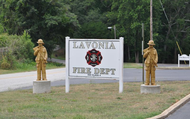 The assistant chief of the Lavonia Fire Department has been charged with four counts of theft by taking.