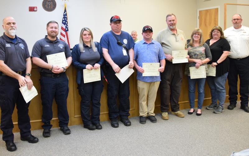 Franklin County emergency responders EMTs Jim Crisp, Teryn Mize and Tyler Lanier; First Responders Curtis Ream and Ricky Maddox of the Gumlog Fire Department; Franklin County Sheriff’s Deputy Mitch Murphy; and dispatchers Teresa Boudway and Donna Maisonett were recognized by EMS Director Terry Harris Tuesday for their life-saving efforts for a patient in September. (Photos by Scoggins)