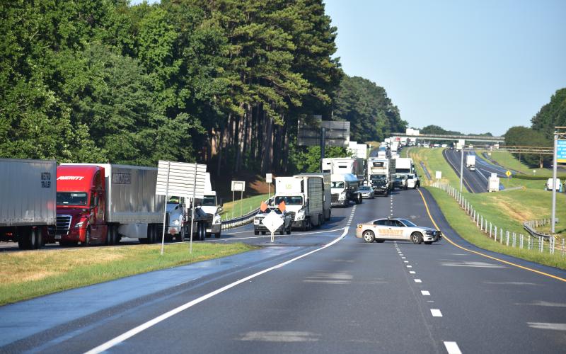 Both northbound lanes of I-85 near Exit 177 outside Lavonia were closed during the height of the Monday morning rush hour for an extended period of time for clean-up efforts and an investigation of a fatal accident. (Photos courtesy of Dawson Baker at The Hartwell Sun)