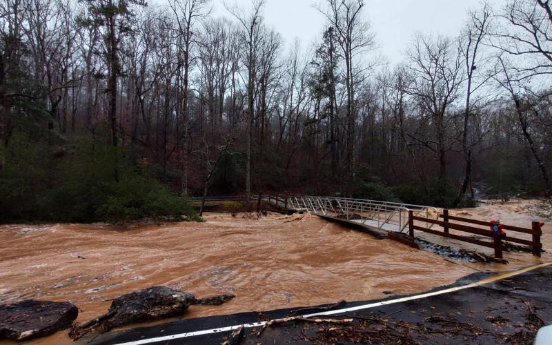 A huge storm system dropped about five inches of rain in about 12 hours on Franklin County Tuesday, swelling creeks and rivers out of their banks, flooding driveways and, along with gusty winds, felling trees.