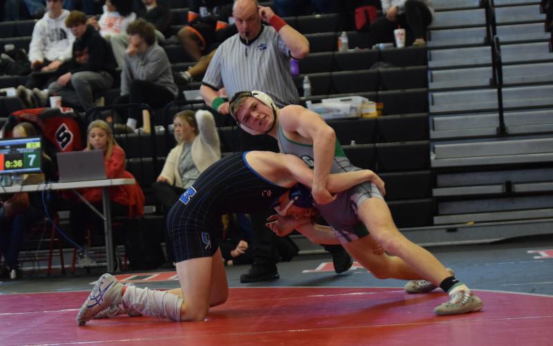 Will Ballenger (above) and Brady Simms are each seeded No. 1 in their respective weight classes for the state tournament, which begins today in Macon.