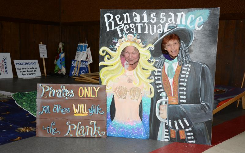 Linda Poss (left) and Vivian Young (right) have been working with others to build and paint decorations for Saturday’s Lavonia Renaissance Festival, which has a “PIrates and Mermaids” theme this year. (Photo by Eavenson)