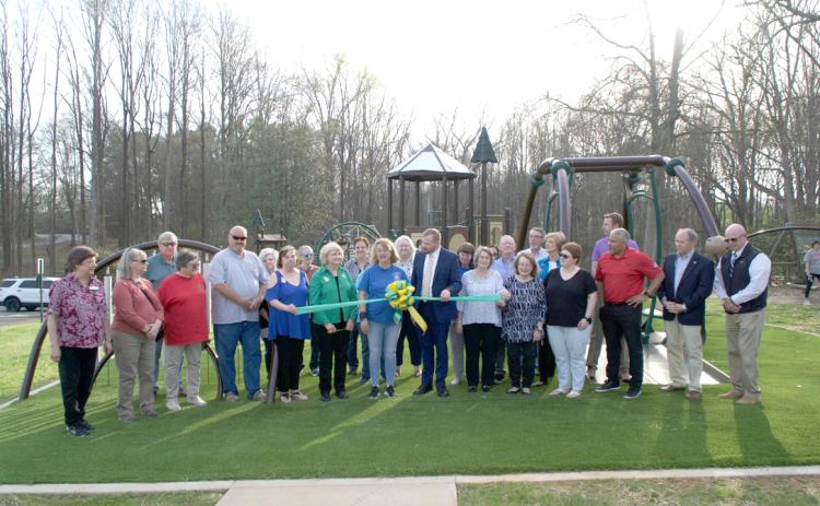 The Pilot Club of Lavonia cut the ribbon on a handicapped-accessible addition to the playground at Lavonia Memorial Park Monday. Club members were joined by city officials for the ceremony. The club raised money for the addition in conjunction with the City of Lavonia. (Photos by Raese)