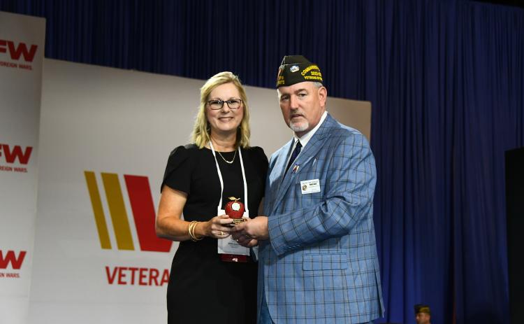 VFW National Middle School Teacher of the Year Susan Allgood (left) has joined the faculty at FCMS. She was presented her award in July by VFW Commander-In-Chief Tim Borland.