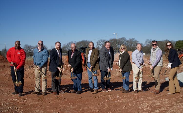 Taking part in a groundbreaking ceremony Monday for a planned Jarrett Foods Plant in Lavonia are (from left) Royston Mayor Keith Thurman, Franklin Springs Mayor Lee Moore, Lavonia Mayor Courtney Umbehant, Jarrett Foods Plant Manager Johnny Willis, Jarrett President Terry Willis, CEO Heath Jarrett, CFO Toni Jarrett, Lavonia City Manager Charles Cawthon, Franklin County Commissioner Kyle Foster and Franklin County Industrial Building Authority Executive Director Tonya Powers.